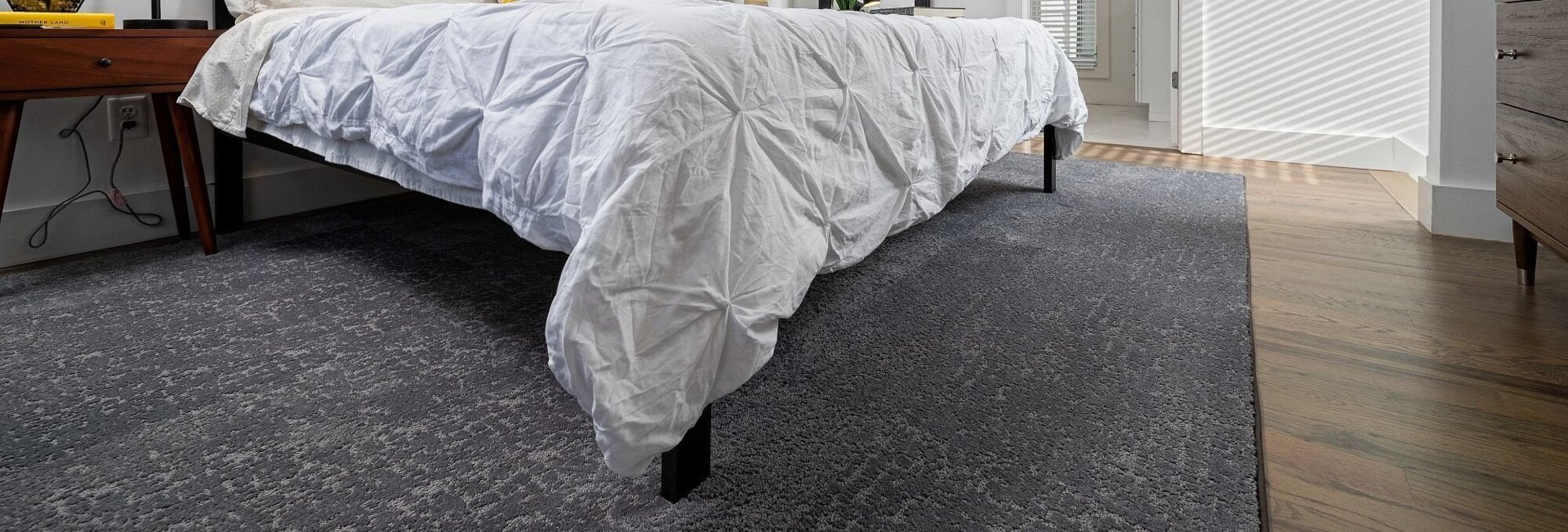 Bed on rug - Nantahala Flooring Outlet in Franklin, NC