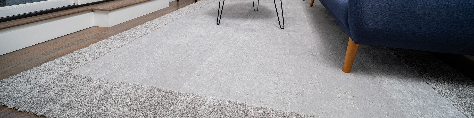Couch and table on the rug - Nantahala Flooring Outlet in Franklin, NC